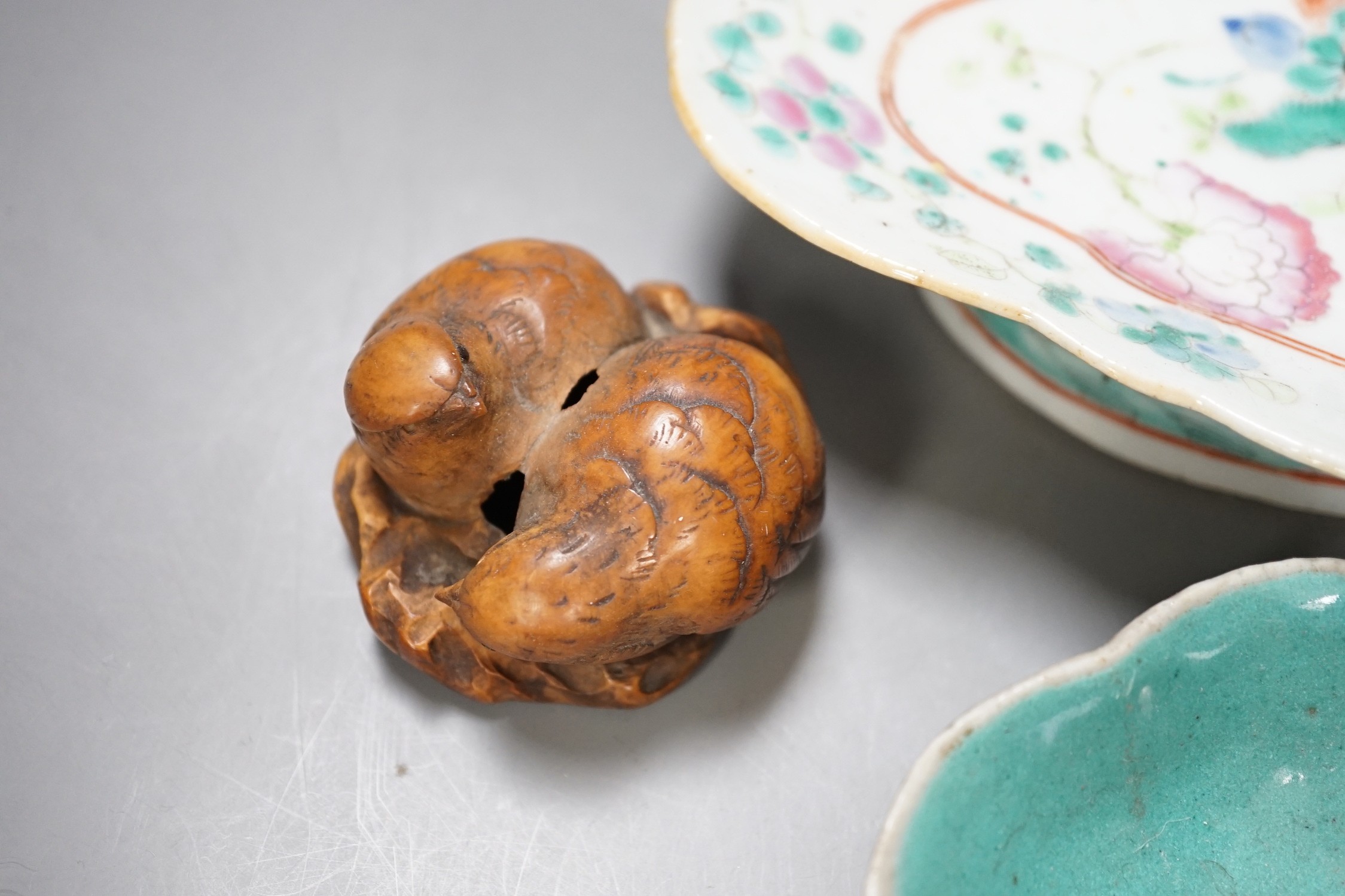 A group of 19th century Chinese porcelain dishes and a vase, and a Japanese ‘bird’ carving etc.